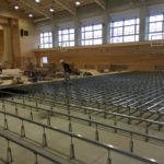 統合集学校体育館新築工事、鋼製床下地組み、フローリングフロア特殊張り工事